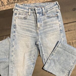American eagle distressed high rise skinny kick jeans with ankle slit